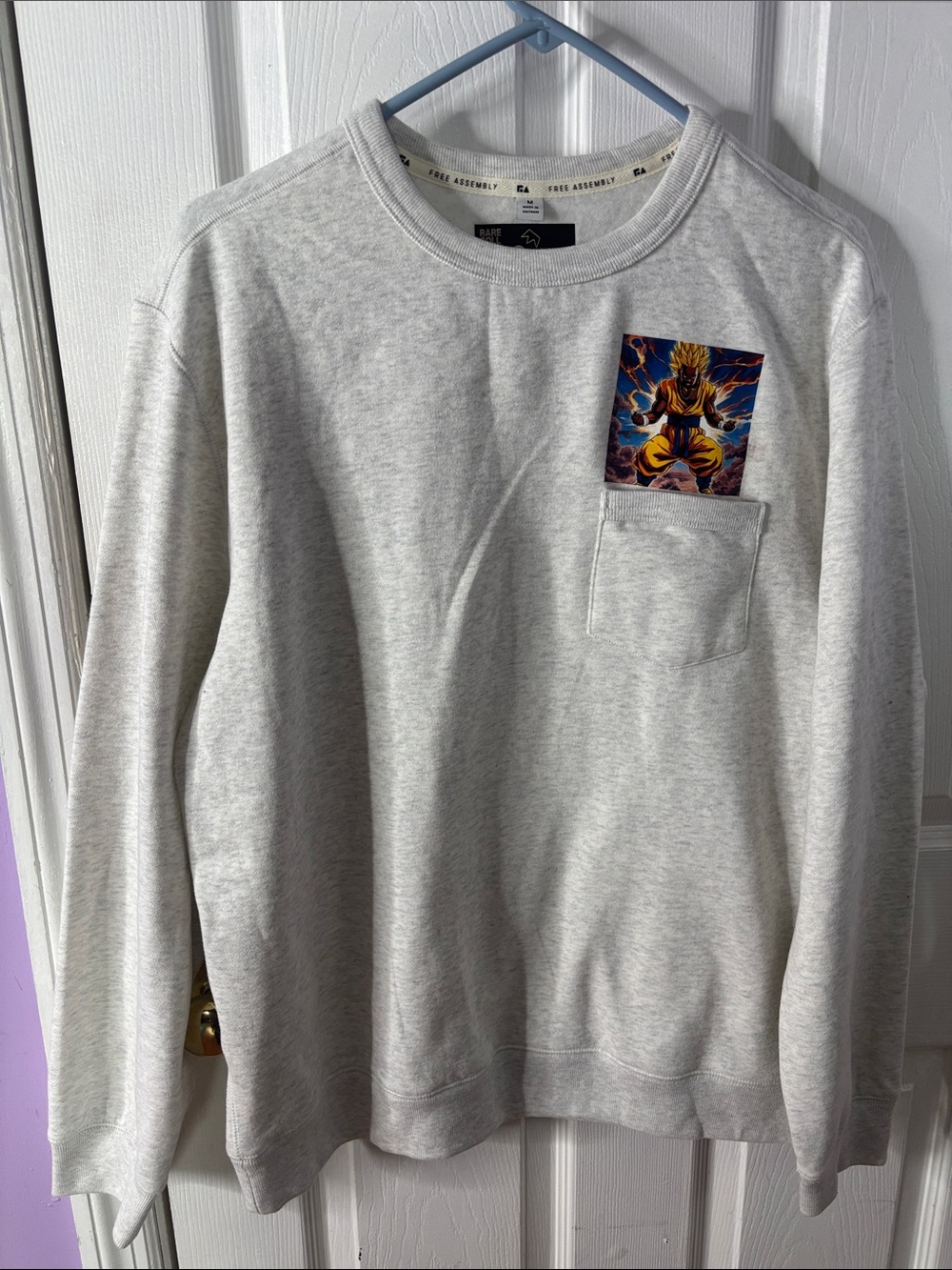 NWOT Light Gray Graphic Pocket Sweatshirt with Anime Patch